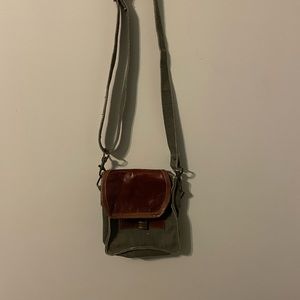 Bag made of recycled material. Very rustic look. Never worn.